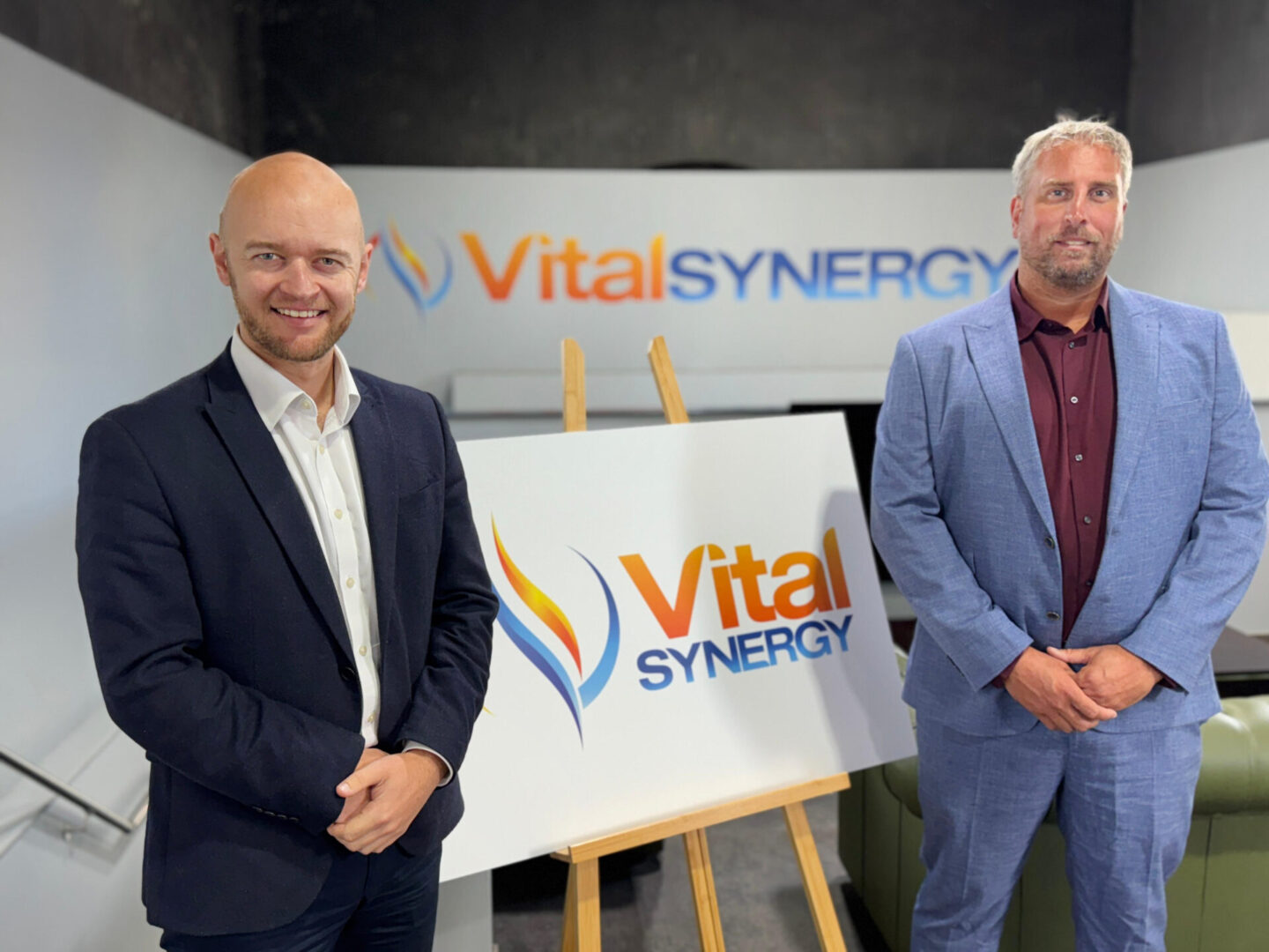 MP Jonathan Hinder and MD Dave Heap stood with new Vital Synergy signage